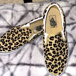 Women’s cheetah print Vans.